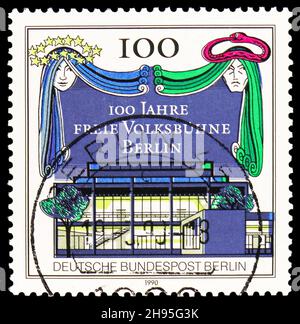 MOSCOW, RUSSIA - OCTOBER 24, 2021: Postage stamp printed in Germany shows Curtain and Theater of the Freie Volksbuhne, Berlin, serie, circa 1990