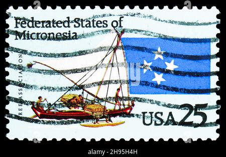 MOSCOW, RUSSIA - OCTOBER 24, 2021: Postage stamp printed in USA shows Federated States of Micronesia - Canoe and Flag, Micronesia and Marshall Islands Stock Photo