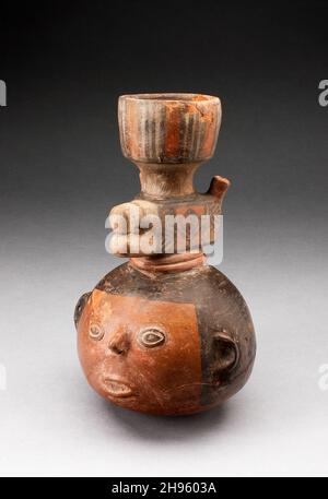 Tall Necked Jar in the Form of an Abstract Head with Animal Forms, A.D. 500/1000. Possibly Niever&#xed;a, Peru or Bolivia. Stock Photo
