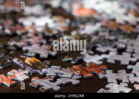 Pieces of a puzzle. Close-up view jigsaw puzzle. Stock Photo