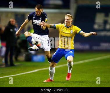 London, UK. 04th Dec, 2021. LONDON, United Kingdom, DECEMBER 04:L-R Jed Wallace of Millwall and Birmingham City's Kristian Pedersen during The Sky Bet Championship between Millwall and Birmingham City at The Den Stadium, London on 04th December 2021 Credit: Action Foto Sport/Alamy Live News Stock Photo