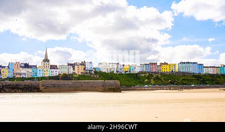 Tenby town panoramic view from the beach. Colorful buildings of popular Welsh resort. Pembrokeshire, Wales, the United Kingdom Stock Photo