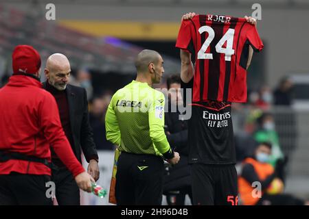 Milan, Italy. 04th Dec, 2021. Alexis Saelemaekers (AC Milan) celebrates after scoring his sideâ&#x80;&#x99;s second goal showing Simon Kjaer (AC Milan) jersey during AC Milan vs US Salernitana, italian soccer Serie A match in Milan, Italy, December 04 2021 Credit: Independent Photo Agency/Alamy Live News Stock Photo