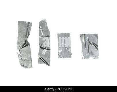 Set of gray adhesive tapes isolated on white background. Set of different size silver grey adhesive tape on white background. Torn and crumpled pieces Stock Photo