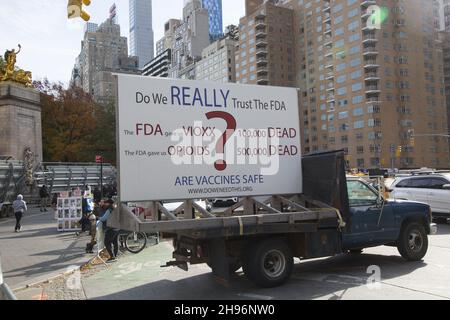 Large signs trucked into Columbus Circle at Central Park the scene of a 'Health Freedom' No Vaccine Mandate' rally and march in Manhattan on November 20, 2021. Stock Photo