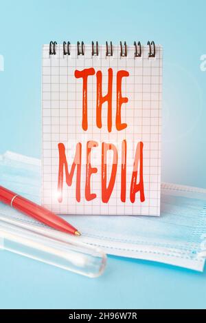 Conceptual caption The Media. Business idea main means of mass communication that are regarded collectively Writing Important Medical Notes Laboratory Stock Photo