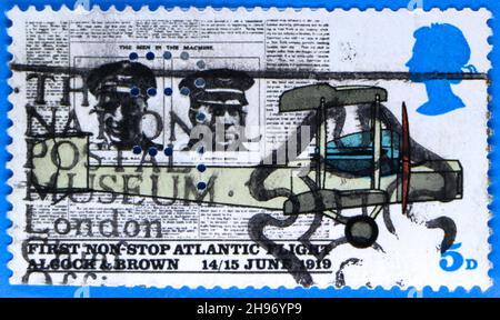 Photo of a postage stamp for the 50th anniversary of Alcock and Brown crossing the Atlantic non-stop in 1919 franked The National Postal Museum London Stock Photo