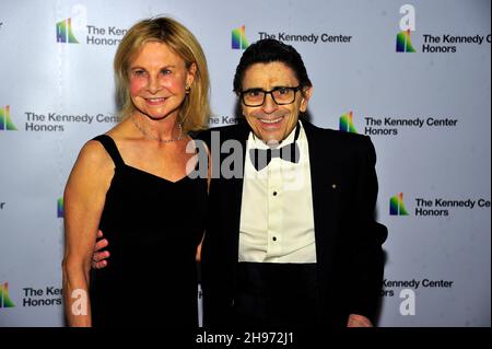 1997 honoree Edward Villella, right, and his wife, Linda, arrive for the Medallion Ceremony honoring the recipients of the 44th Annual Kennedy Center Honors at the Library of Congress in Washington, DC on Saturday, December 4, 2021. The 2021 honorees are: operatic bass-baritone Justino Diaz, Motown founder, songwriter, producer and director Berry Gordy, ‘Saturday Night Live' creator Lorne Michaels, legendary stage and screen icon Bette Midler, and singer-songwriter Joni Mitchell.Credit: Ron Sachs/Pool/Sipa USA Stock Photo
