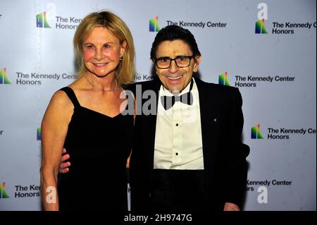 Washington, Vereinigte Staaten. 04th Dec, 2021. 1997 honoree Edward Villella, right, and his wife, Linda, arrive for the Medallion Ceremony honoring the recipients of the 44th Annual Kennedy Center Honors at the Library of Congress in Washington, DC on Saturday, December 4, 2021. The 2021 honorees are: operatic bass-baritone Justino Diaz, Motown founder, songwriter, producer and director Berry Gordy, Saturday Night Live creator Lorne Michaels, legendary stage and screen icon Bette Midler, and singer-songwriter Joni Mitchell. Credit: Ron Sachs/Pool via CNP/dpa/Alamy Live News Stock Photo