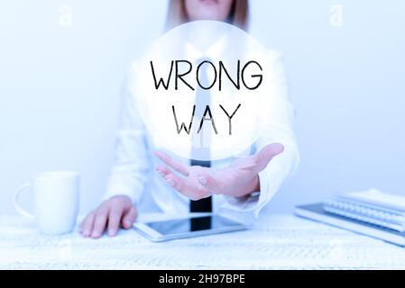 Text caption presenting Wrong Way. Conceptual photo taking an unsuitable or undesirable manners or direction Developer Discussing Gadget Upgrade Stock Photo