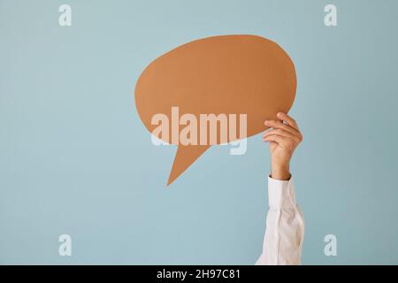 Man hold speech bubble with copy space Stock Photo