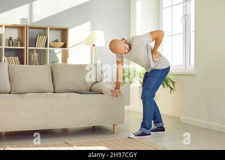 Unwell man suffer from lower back muscle spasm Stock Photo