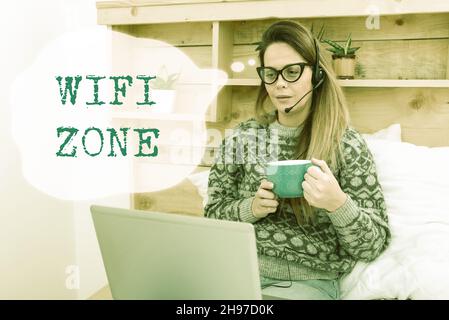 Sign displaying Wifi Zone. Business approach provide wireless highspeed Internet and network connections Student Learning New Things Online, Casual Stock Photo