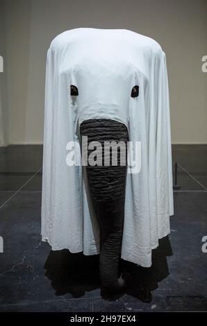 Beijing, China. 05th Dec, 2021. Elephant covered with a sheet at Maurizio Cattelan: The Last Judgment art exhibition in UCCA Center for Contemporary Art in Beijing, China on 05/12/2021 by Wiktor Dabkowski Credit: dpa/Alamy Live News Stock Photo