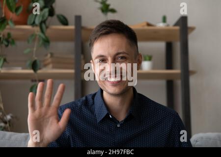 Happy business man in casual making video call from home Stock Photo