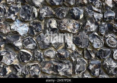 Close up view of an old flit stone wall in Canterbury, Kent, UK Stock Photo