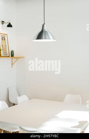 White table and chairs in a meeting room of a new workplace Stock Photo