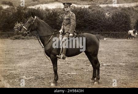 A First World War era portrait of a British army soldier, a Private in the Lancashire Fusiliers, mounted on a horse. Stock Photo