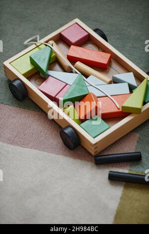 Close-up of wooden van with colorful blocks in it for children to play and educated Stock Photo