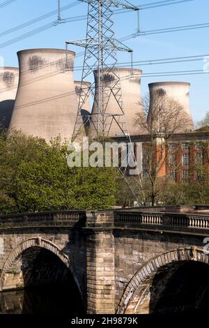 Ferrybridge C Power Station, West Yorkshire, 2018. General view of the power station's cooling towers from the south-east, with Ferry Bridge over the River Aire in the foreground. Stock Photo