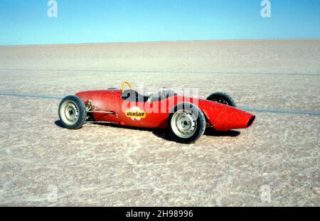 Elfin Ford used to test the grip of scale models of Bluebird CN7's tyres on the salt, driven by Andrew Mustard during Donald Campbell's World Land Speed Record attempt, Lake Eyre, Australia, 1964. Stock Photo