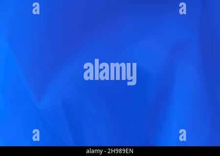 Blue textile fabric. Selective focus. Top view. Stock Photo