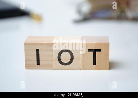 Iot or Internet of things concept on wooden blocks. Stock Photo