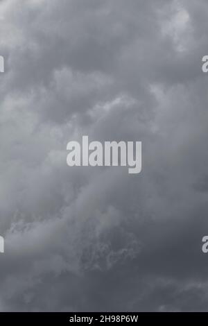 Dark grey clouds at sky Stock Photo