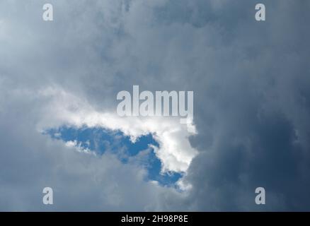 Dark grey clouds at sky Stock Photo