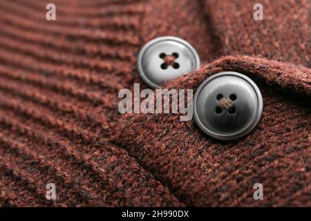 Closeup view of buttons on warm sweater Stock Photo