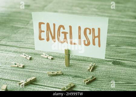 Conceptual caption English. Word Written on Related to England showing language culture British Literature class Piece Of Blank Square Note Surrounded Stock Photo