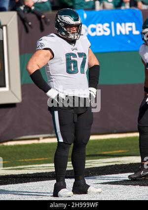 New York Jets guard Nate Herbig (65) walks to the line of scrimmage against  the New England Patriots during an NFL football game Sunday, Oct. 30, 2022,  in East Rutherford, N.J. (AP