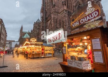 Famous Christmas market on the cathedral square in Strasbourg in Alsace. Health precautions and mandatory barrier gestures, protections against the co Stock Photo