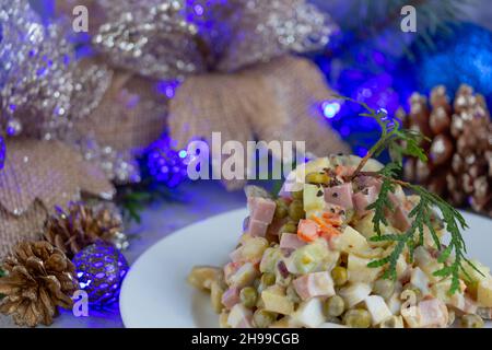 Traditional Russian New Year salad Olivier, serving New Year's, Christmas salad Stock Photo