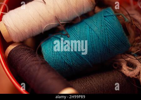 Threads for sewing with a needle. Macro effect Stock Photo