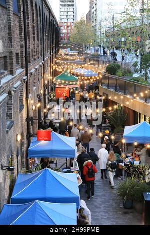 The Christmas market on Lower Stable Street, at Coal Drops Yard, Kings Cross, north London, UK Stock Photo