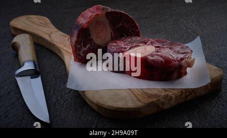 Raw veal shanks on cutting board Stock Photo
