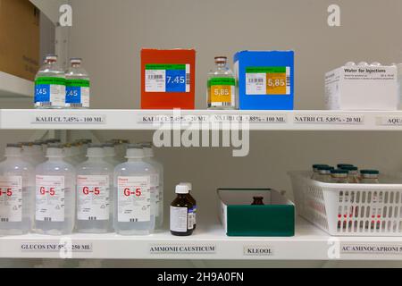 Modern hospital storage facilities, shelves of products for treatment and hospital procedures. Stock Photo