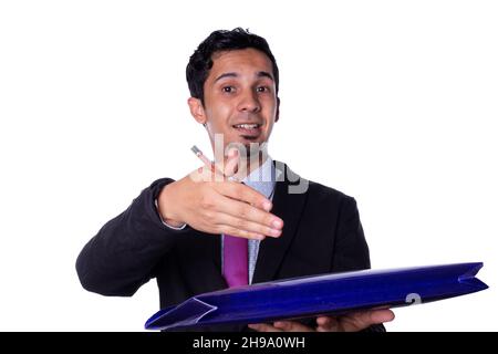 Young worker showing a folder to camera while smiling, isolated on white background. Stock Photo