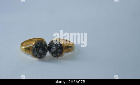 Pair of black diamond ring isolated on white background Stock Photo
