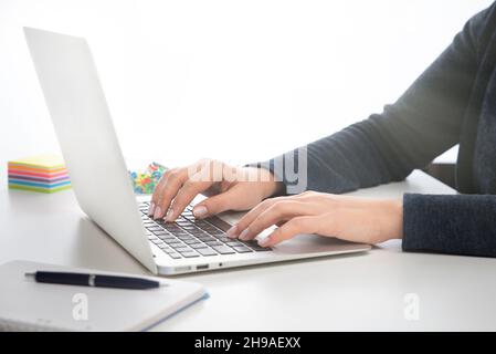 Woman using laptop, online shopping concept, close up Stock Photo