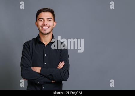 Satisfied caucasian guy looking at camera with a big laugh Stock Photo