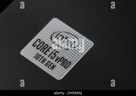 Intel Corporation logo on a sticker of a Lenovo Thinkpad with a Core i5 10th gen processor. Stock Photo