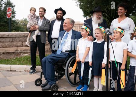 Texas Gov. Abbott poses for pictures with Astros World Series