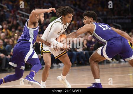 December 05, 2021: Wichita State Shockers guard Tyson Etienne (1) sets ...