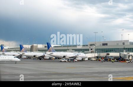 Aurora Colorado USA June 10 2021; Rows of planes are delayed at this airport, as storms move in and flights are canceled or slowed down Stock Photo
