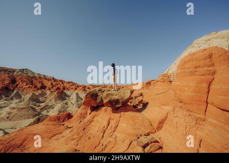 Silhouette of woman hiking in wilderness area. Grand Staircase-Escalante national monumen, Utah. Stock Photo