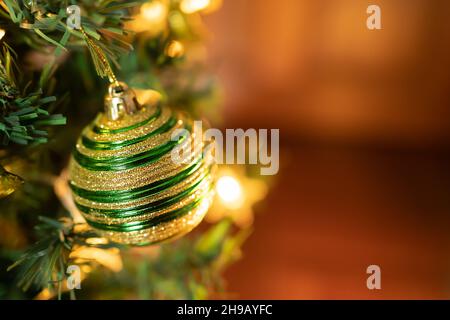 Christmas tree with decorations and lights background Stock Photo