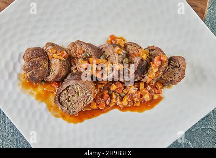 Veal rolls stuffed in white wine. French gourmet cuisine Stock Photo