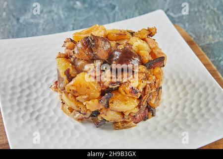 Tartare with potatoes and chestnuts in red wine. French gourmet cuisine Stock Photo